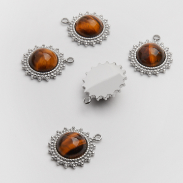 Zawieszka ze stali chirurgicznej słoneczko z tygrysim okiem w kolorze srebrnym 19mm