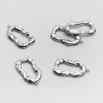 Zawieszka ze stali chirurgicznej nieregularny owal w kolorze srebrnym 23mm