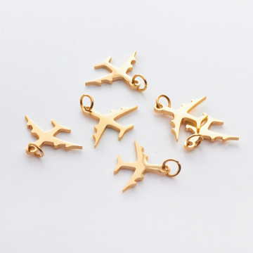 Zawieszka ze stali chirurgicznej samolot w kolorze złotym 9,5mm