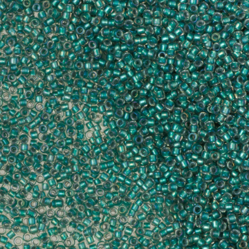 Koraliki TOHO Round Inside-Color Rainbow Crystal/Teal Lined 15/0