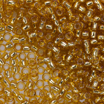 Koraliki TOHO Round 6/0 Silver-Lined Med Topaz