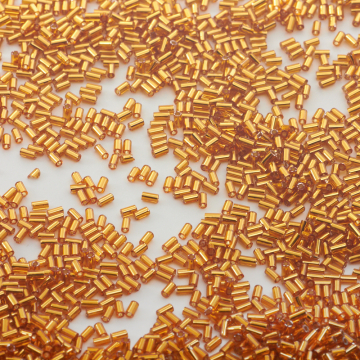 TOHO - Bugle #1   Silver-Lined Topaz