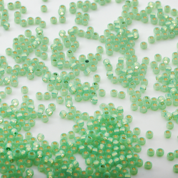 TOHO - Round 8/0  Silver-Lined Milky Peridot