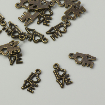 Zawieszka napis 'love' antyczna 15,5x8mm