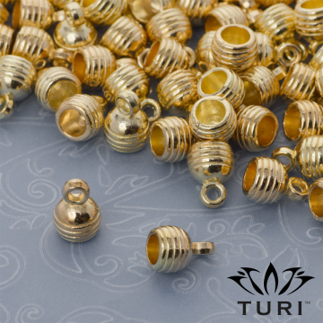 Rowkowana końcówka do rzemieni w kolorze złotym 4mm