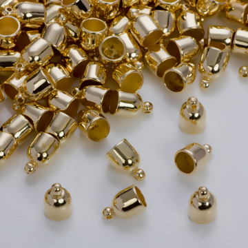 Okrągłe końcówki do rzemieni i sznurków w złotym kolorze 6,5mm
