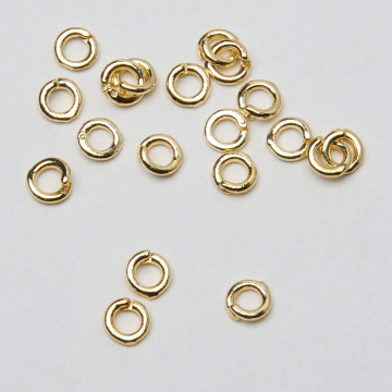 Kółeczko z zabezpieczeniem do podwieszania zawieszek mosiądz pozłacany 14k Au585 5,5mm