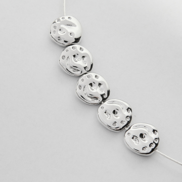 Przekładka krążek nieregularny z mosiądzu w kolorze srebrnym 13x4,5mm