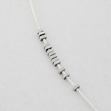 Przekładka kwadracik z mosiądzu w kolorze srebrnym 2x1mm