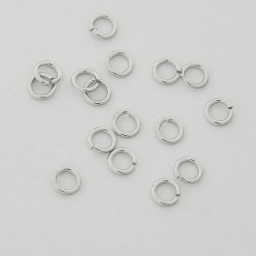 Kółeczka zaciskowe z mosiądzu w kolorze srebrnym 4x0,7mm