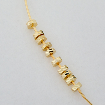 Przekładka oponka nacinana z mosiądzu w kolorze złotym 5x2mm