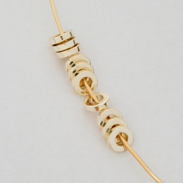 Przekładka oponka gładka z mosiądzu w kolorze złotym 6x1,5mm