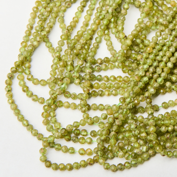 Peridot kulka fasetowana 4mm