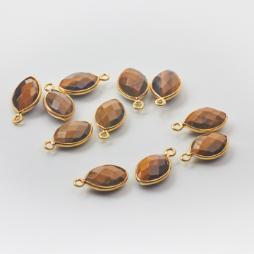 Zawieszka tygrysie oko wrzeciono fasetowane w okuciu AG925 pozłacane 12x8mm