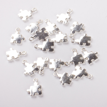 Srebrna zawieszka do bransoletek mini puzzel AG925 11x8mm