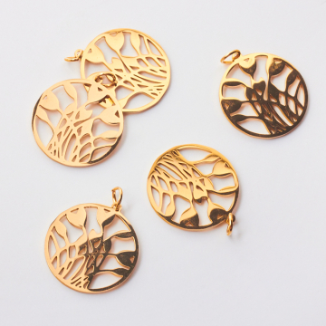 Zawieszka ze stali szlachetnej tulipany w kółku do naszyjników w kolorze złotym 22mm