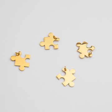 Zawieszka ze stali szlachetnej puzzel w kolorze złotym 15,5mm