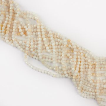 Muszla biała kulka fasetowana 4mm Muszla biała kulka fasetowana 4mm