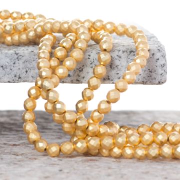 Hematyt platerowany kulka fasetowana light gold satine 6mm