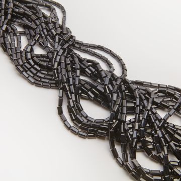 Kryształki słupki fasetowane jet 4,5x8,5mm