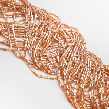 Kryształki słupki fasetowane shampagne AB 2,5x4,5mm