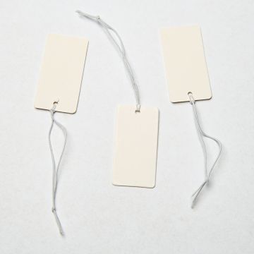 Metka z gumką do bizuterii biała 18x36mm