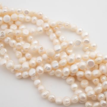 Perły hodowlane słodkowodne button 6-7mm Perły hodowlane słodkowodne button 6-7mm