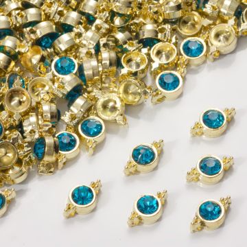 Przekładka z kryształkiem koloru złotego capri blue  10mm