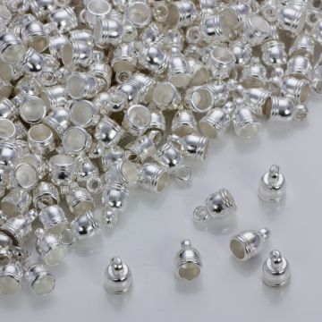 Końcówki do rzemieni i sznurków beczułki w srebrnym kolorze 4mm