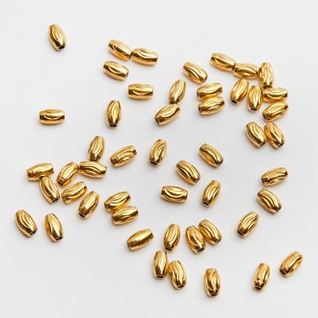 Przekładka oliwka nacinana ze stali chirurgicznej w kolorze złotym 3x5mm