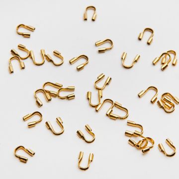 Końcówki skobelki do linek i nici ze stali chirurgicznej w kolorze złotym 5mm