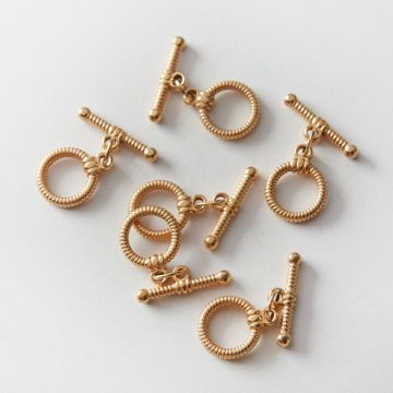 Zapięcie toggle ze stali chirurgicznej nacinane w kolorze złotym 12mm