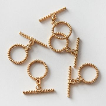 Zapięcie toggle ze stali chirurgicznej spiralka w kolorze złotym 16mm