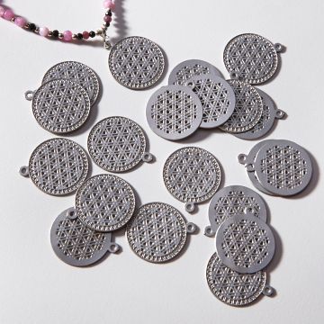 Zawieszka ze stali chirurgicznej kwiat życia w kolorze srebrnym 18,4mm