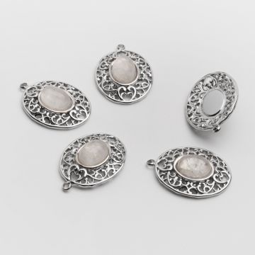 Zawieszka ze stali chirurgicznej ażurowy owal z kryształem górskim w kolorze srebrnym 21mm