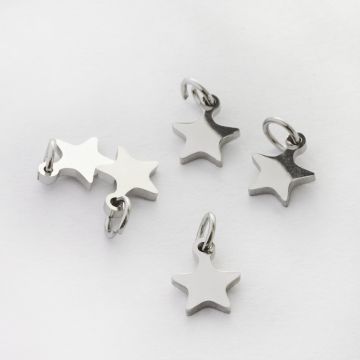 Mini zawieszka ze stali chirurgicznej gwiazdka w kolorze srebrnym 7mm