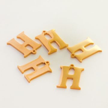 Zawieszka ze stali szlachetnej literka H w kolorze złotym 16,5mm