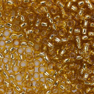 Koraliki TOHO Round 6/0 Silver-Lined Med Topaz