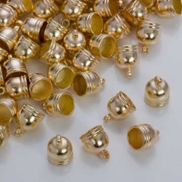 Końcówki do rzemieni i sznurków beczułki w złotym kolorze 8,5mm