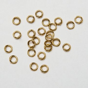 Końcówki okrągłe do nici, linek, sznureczków ze stali chirurgicznej w kolorze złotym 0,7mm