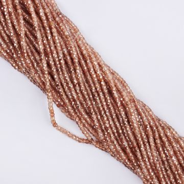 Cyrkonia oponka fasetowana 3x2mm beżowa Cyrkonia oponka fasetowana 3x2mm beżowa