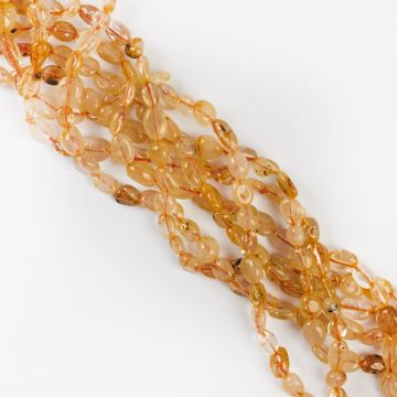 Kryształ górski z rutylem złotym bryłka nieregularna 4x12mm