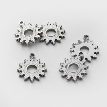 Zawieszka ze stali chirurgicznej grawerowana słoneczko wycięte w kolorze srebrnym 11,5mm