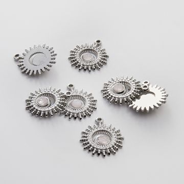 Zawieszka ze stali chirurgicznej słoneczko z różowym kryształem górskim w kolorze srebrnym 20,5mm