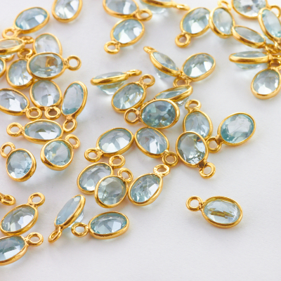 Topaz błękitny owal fasetowany w okuciu zawieszka AG925 6,5mm