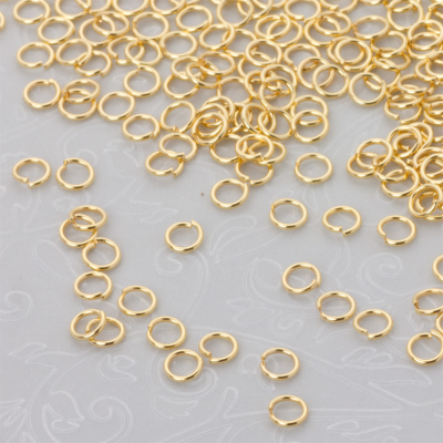 Kółeczka zaciskowe ze stali szlachetnej w kolorze złotym 4x0,6mm PVD