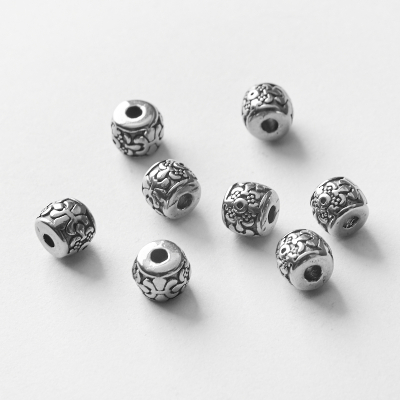 Koralik ze stali oponka rzeźbiona 5,5x7mm