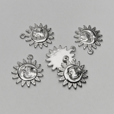 Zawieszka ze stali chirurgicznej słońce z księżycem w kolorze srebrnym 24mm