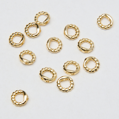 Końcówki okągłe skręcane do nici, linek, sznureczków z mosiądzu w kolorze złotym 0,7mm