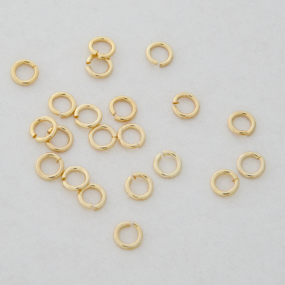 Kółeczka zaciskowe z mosiądzu w kolorze złotym 4x0,7mm